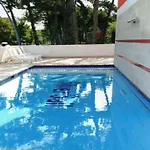 Enjoy Poolside Comfort-beahost Lägenhet